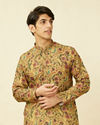 alt message - Manyavar Men Melon Orange Floral Printed Kurta Set image number 0