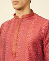 alt message - Manyavar Men Coral Red Diamond Printed Kurta Set image number 1