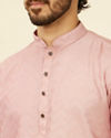 alt message - Manyavar Men Peach Chevron Patterned Kurta Set image number 1