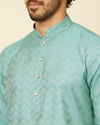 alt message - Manyavar Men Aqua Green Ikat Patterned Kurta Set image number 1