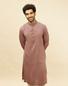 alt message - Manyavar Men Foxy Pink Chevron Patterned Kurta Set image number 0