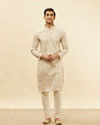 alt message - Manyavar Men Cream Overlapping Printed Kurta Set image number 2