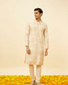 alt message - Manyavar Men Peach Beige Kaleidoscopic Patterned Kurta Set image number 2