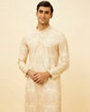 alt message - Manyavar Men Peach Beige Kaleidoscopic Patterned Kurta Set image number 0