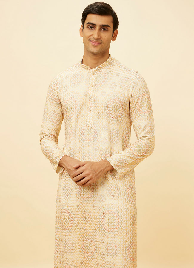 alt message - Manyavar Men Peach Beige Kaleidoscopic Patterned Kurta Set image number 0