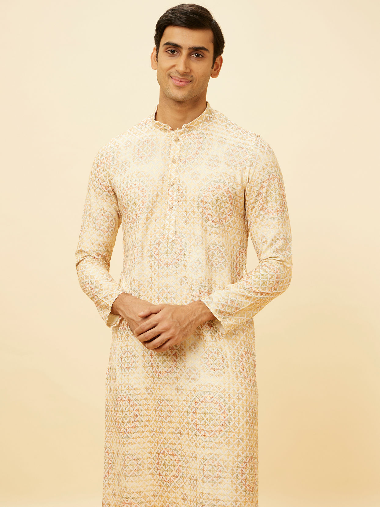 alt message - Manyavar Men Peach Beige Kaleidoscopic Patterned Kurta Set image number 0