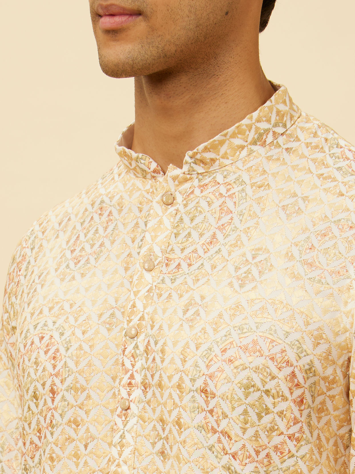 alt message - Manyavar Men Peach Beige Kaleidoscopic Patterned Kurta Set image number 1