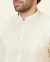 alt message - Manyavar Men Buttercream Ditsy Floral Chikankari Kurta Set image number 1