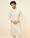 alt message - Manyavar Men Buttercream Ditsy Floral Chikankari Kurta Set image number 0