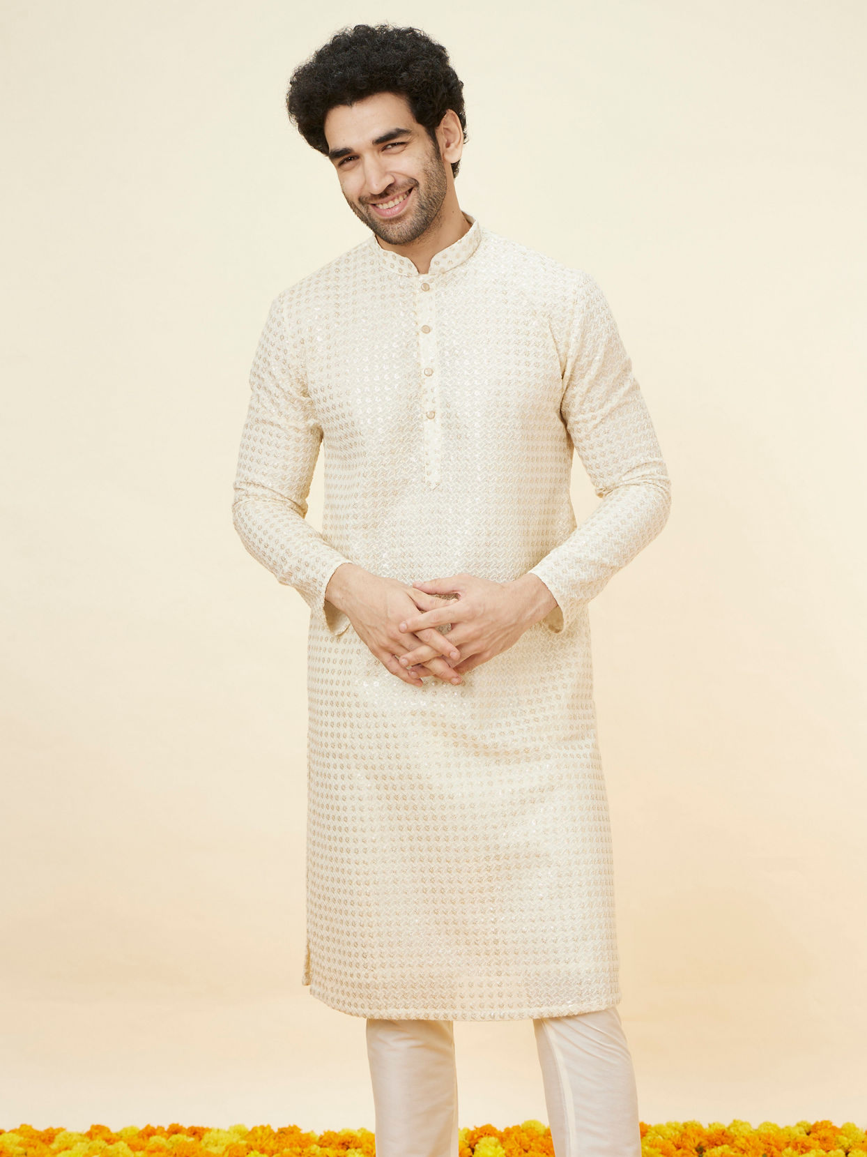 alt message - Manyavar Men Buttercream Ditsy Floral Chikankari Kurta Set image number 0