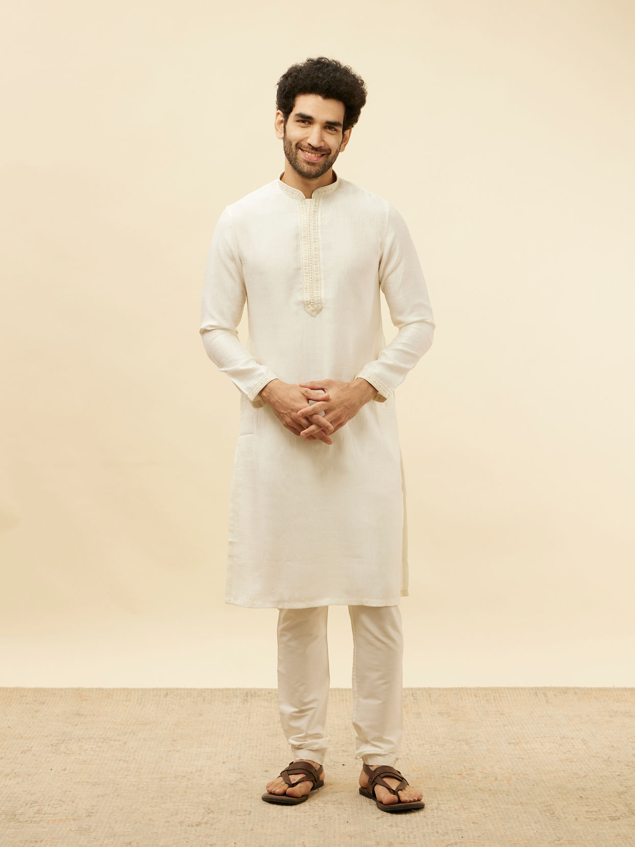 alt message - Manyavar Men Warm White Embroidered Neckline Kurta Set image number 2