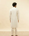 alt message - Manyavar Men Warm White Embroidered Neckline Kurta Set image number 5