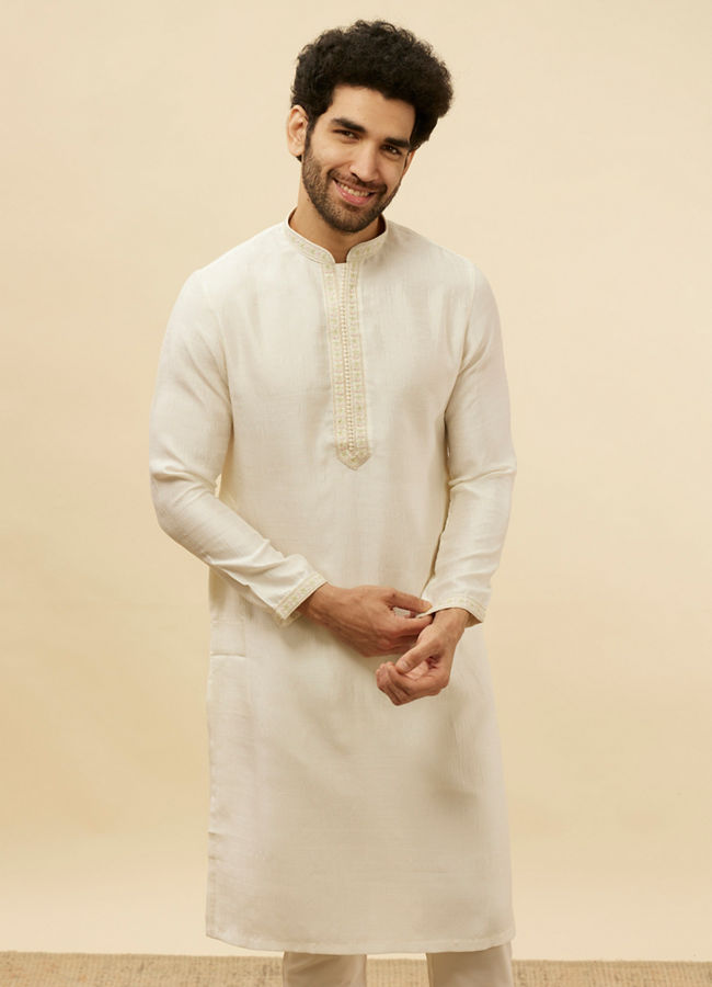 alt message - Manyavar Men Warm White Embroidered Neckline Kurta Set image number 0