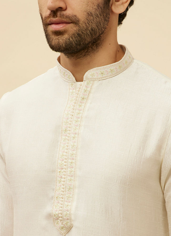 alt message - Manyavar Men Warm White Embroidered Neckline Kurta Set image number 1