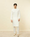 alt message - Manyavar Men Pearled Ivory White Linear Patterned Kurta Set image number 2