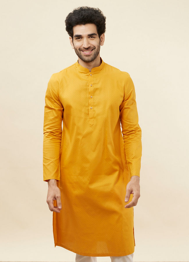 alt message - Manyavar Men Sunrise Orange Self Patterned Kurta Set image number 0