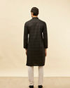 alt message - Manyavar Men Coal Black Self Patterned Kurta Set image number 5