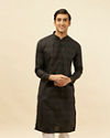 alt message - Manyavar Men Coal Black Self Patterned Kurta Set image number 0