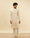 Manyavar Men Soft Cream Self Textured Kurta Set