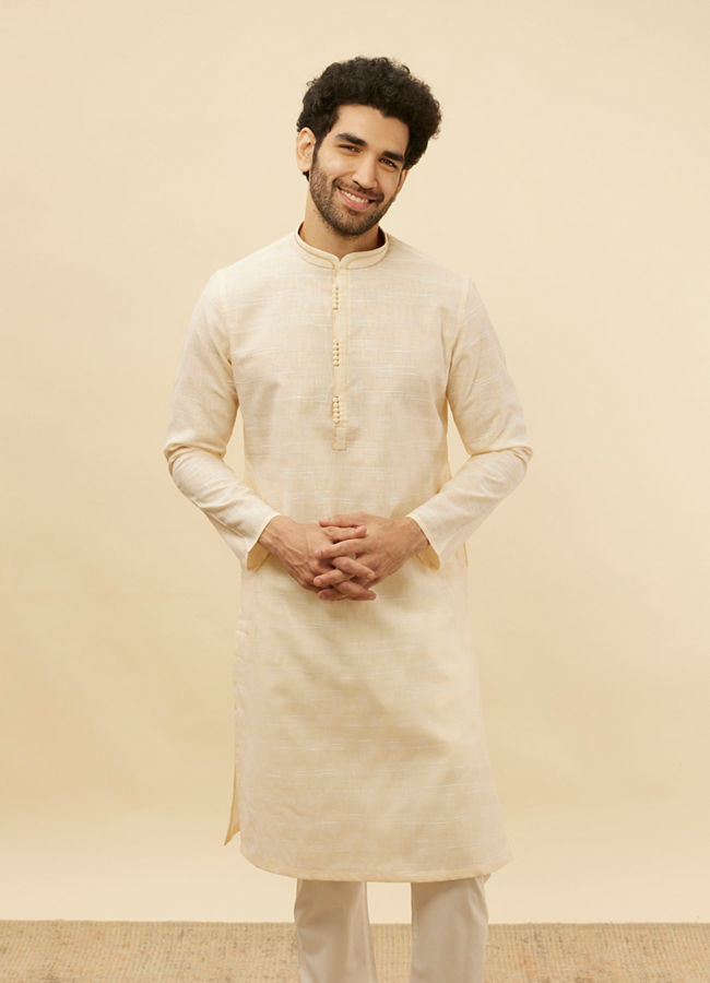 alt message - Manyavar Men Soft Cream Self Textured Kurta Set image number 0