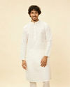 alt message - Manyavar Men Warm White Grid Patterned Kurta Set image number 0