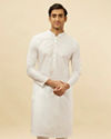 alt message - Manyavar Men Bright White Chevron Patterned Kurta Set image number 0