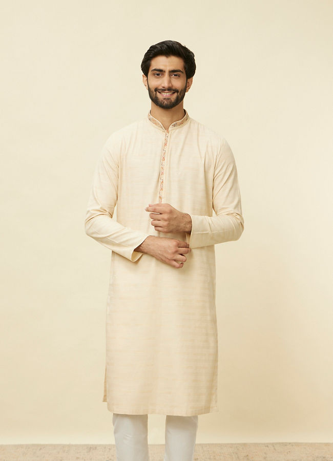 alt message - Manyavar Men Sand Beige Embroidered Neckline Kurta Set image number 0