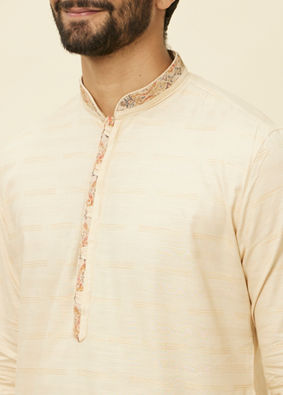 alt message - Manyavar Men Sand Beige Embroidered Neckline Kurta Set image number 1