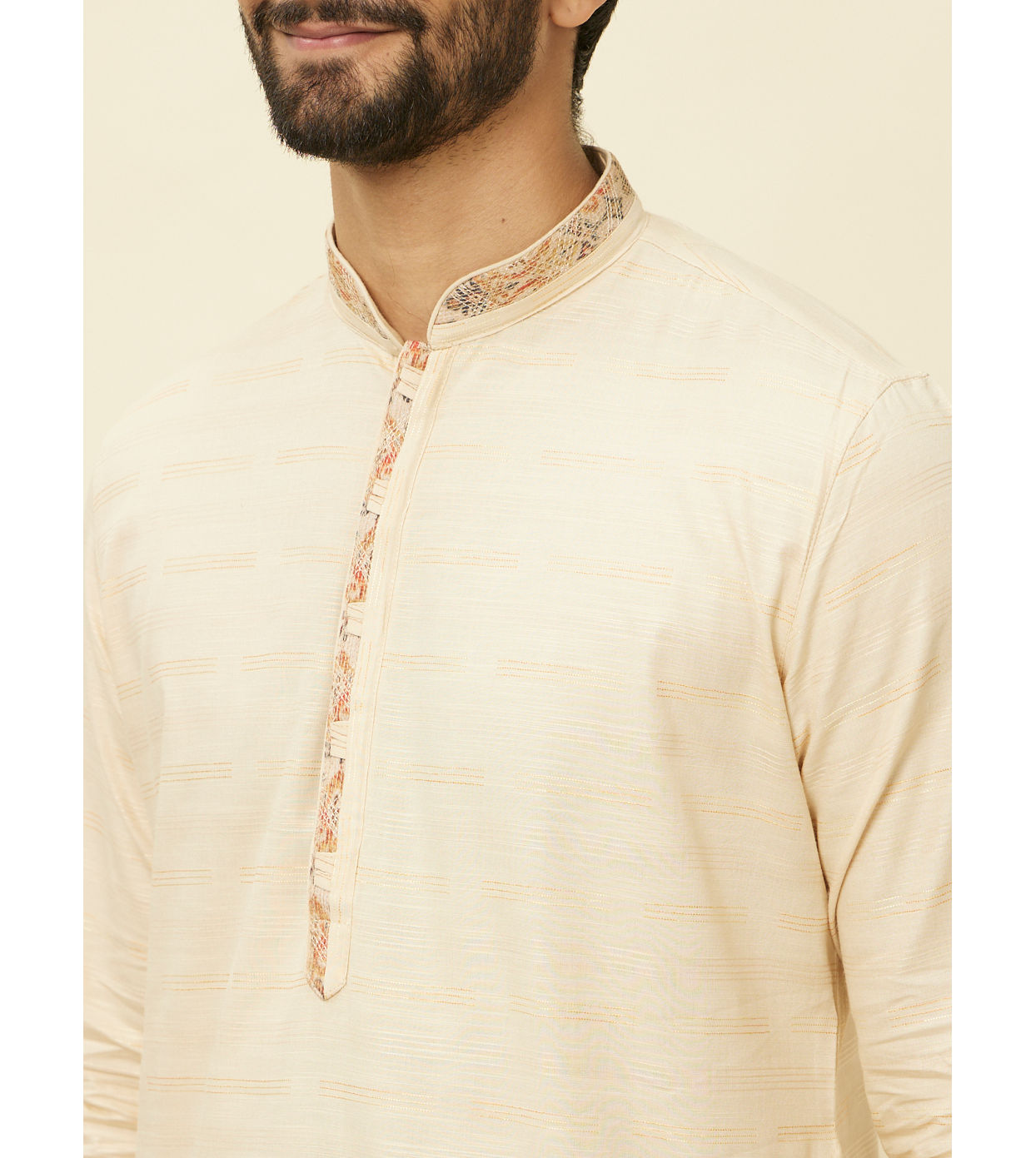 alt message - Manyavar Men Sand Beige Embroidered Neckline Kurta Set image number 1