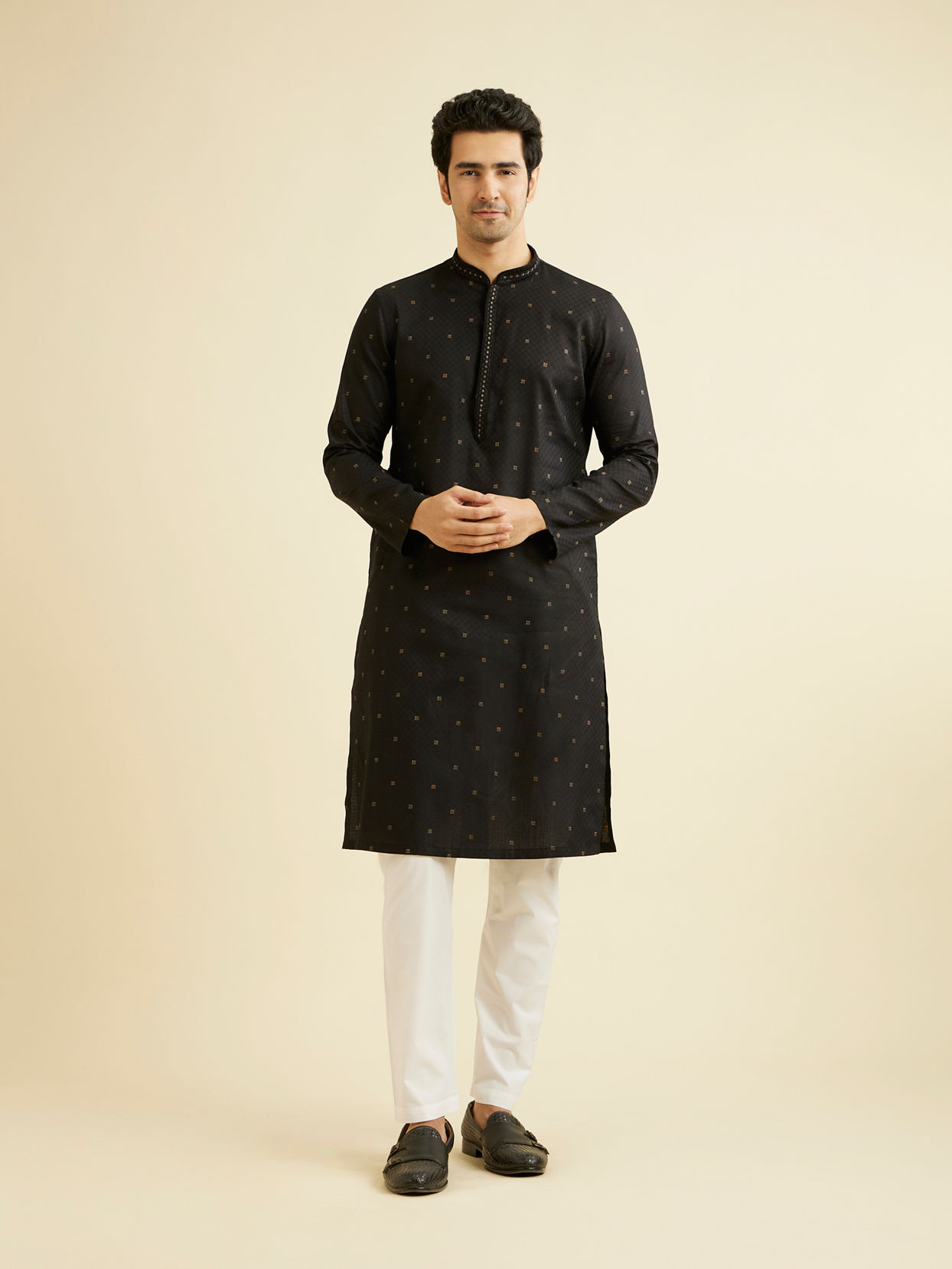 alt message - Manyavar Men Ebony Black Kurta Set with Embroidered Neckline image number 2