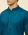 alt message - Manyavar Men Sapphire Blue Checkered Kurta Set image number 1