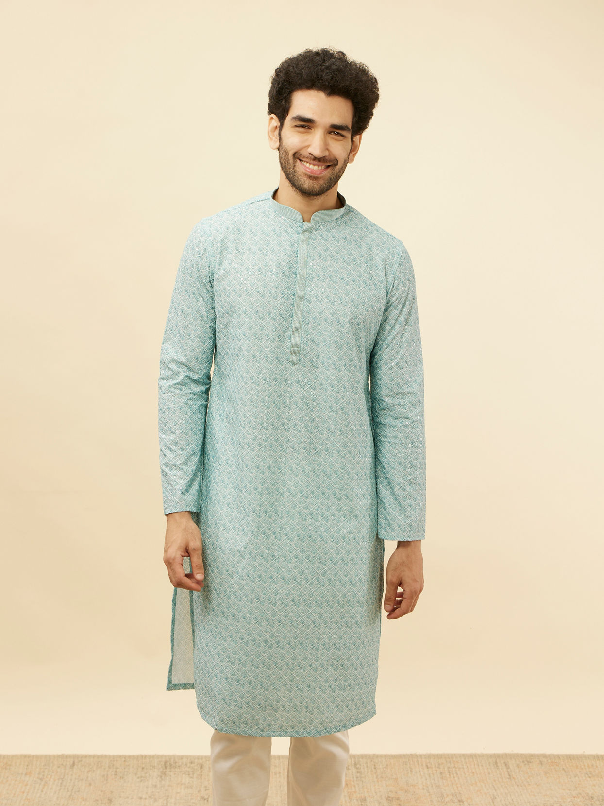 alt message - Manyavar Men Aqua Blue Chikankari Embroidered Sequined Kurta Set image number 0