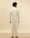 alt message - Manyavar Men Warm White Floral Chikankari Embroidered Kurta Set image number 5