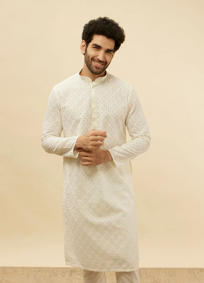 alt message - Manyavar Men Warm White Floral Chikankari Embroidered Kurta Set image number 0