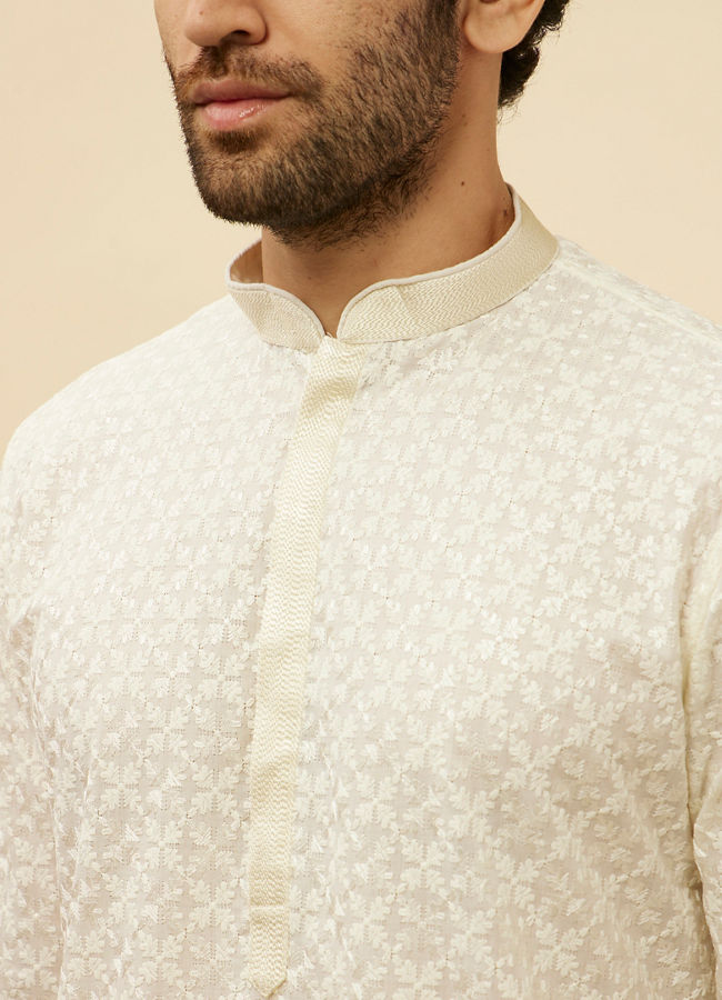 alt message - Manyavar Men Warm White Floral Chikankari Embroidered Kurta Set image number 1