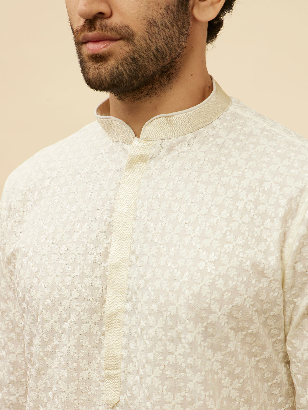 alt message - Manyavar Men Warm White Floral Chikankari Embroidered Kurta Set image number 1