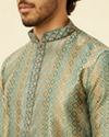 alt message - Manyavar Men Tropical Blue Diamond Patterned Kurta Set image number 1