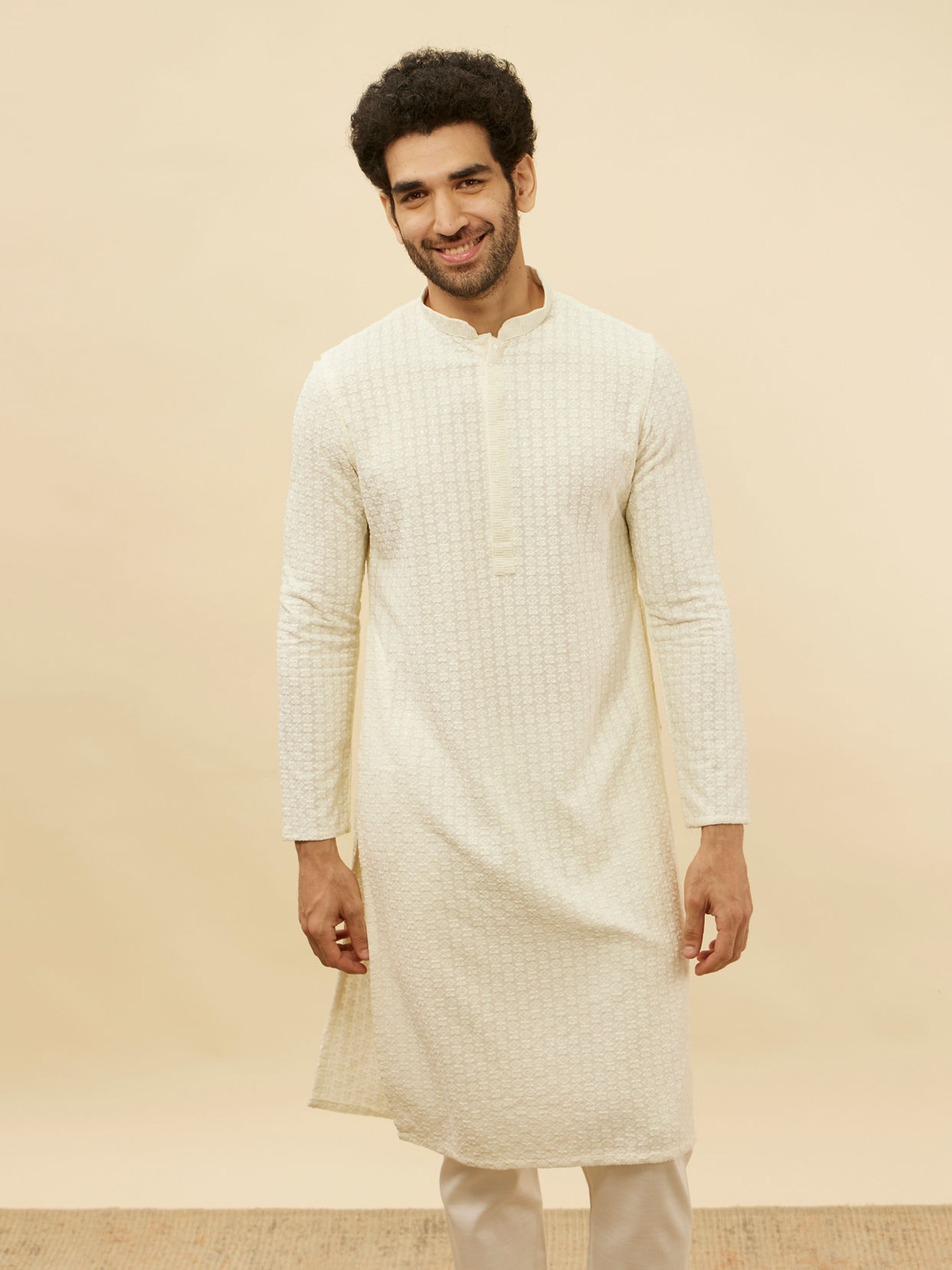 alt message - Manyavar Men Soft Cream Chikankari Sequinned Kurta Set image number 0