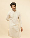 alt message - Manyavar Men Light Cream Lattice Patterned Sequinned Kurta image number 0