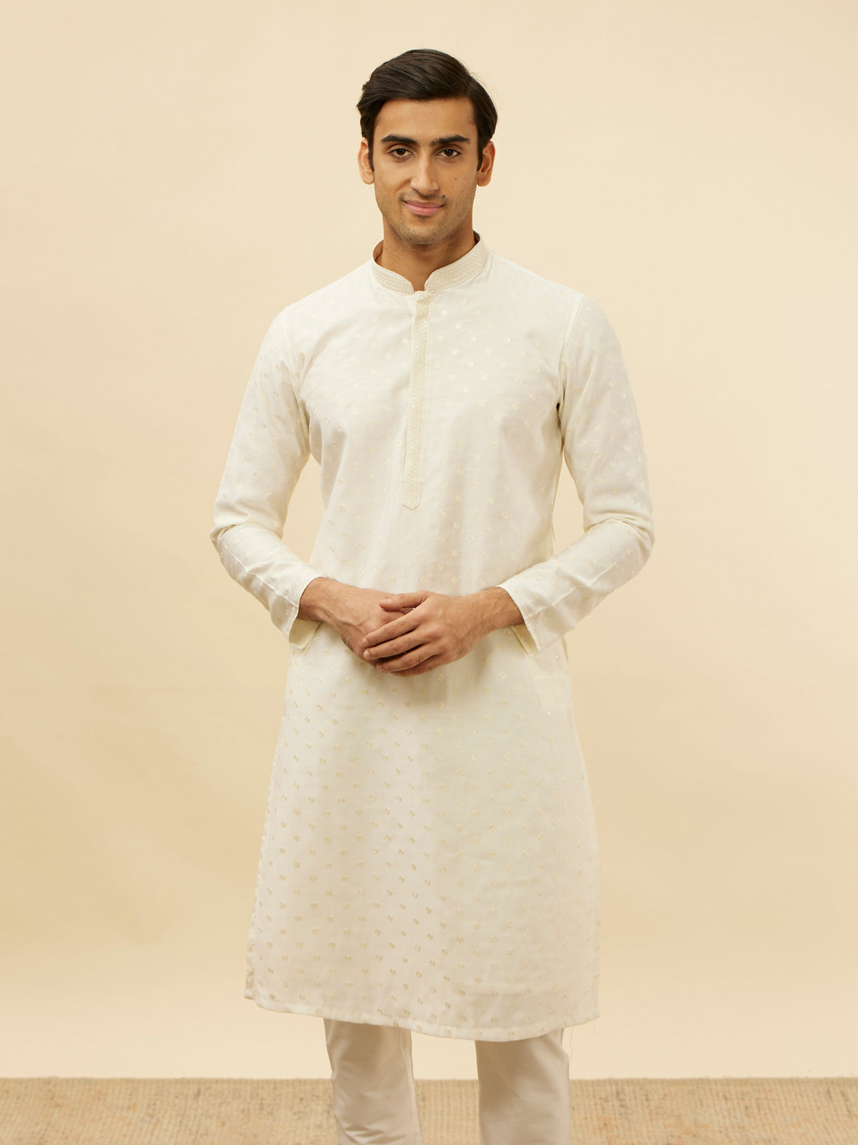 alt message - Manyavar Men Bright Cream Dotted Sequinned Kurta Set image number 0