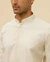 alt message - Manyavar Men Bright Cream Dotted Sequinned Kurta Set image number 1