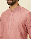 alt message - Manyavar Men Conch Shell Pink Sequined Kurta Set image number 1