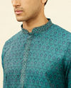 alt message - Manyavar Men Teal Blue Imperial Patterned Kurta Set image number 1