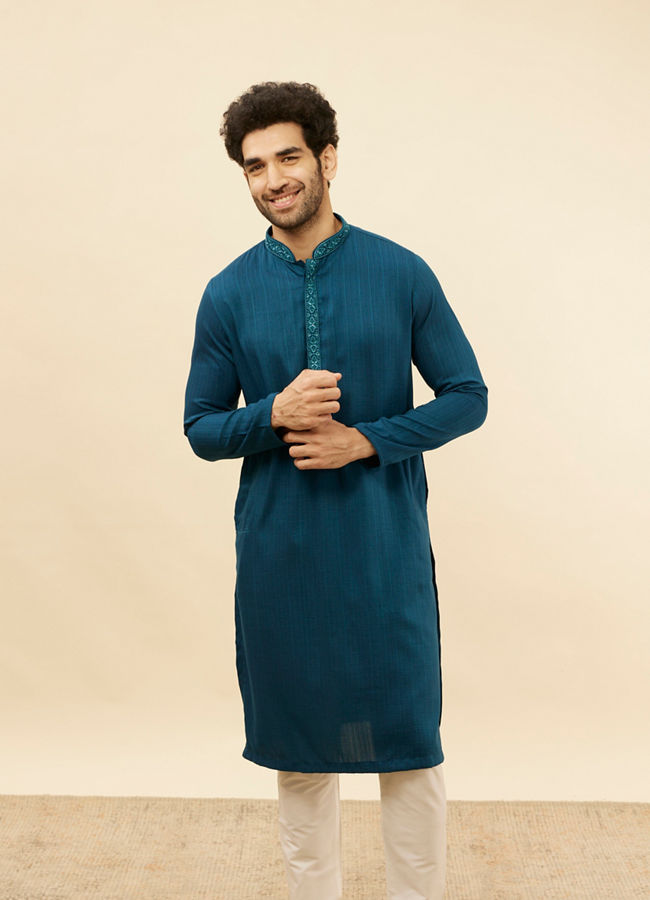 alt message - Manyavar Men Azure Blue Embroidered Placket Kurta Set image number 0