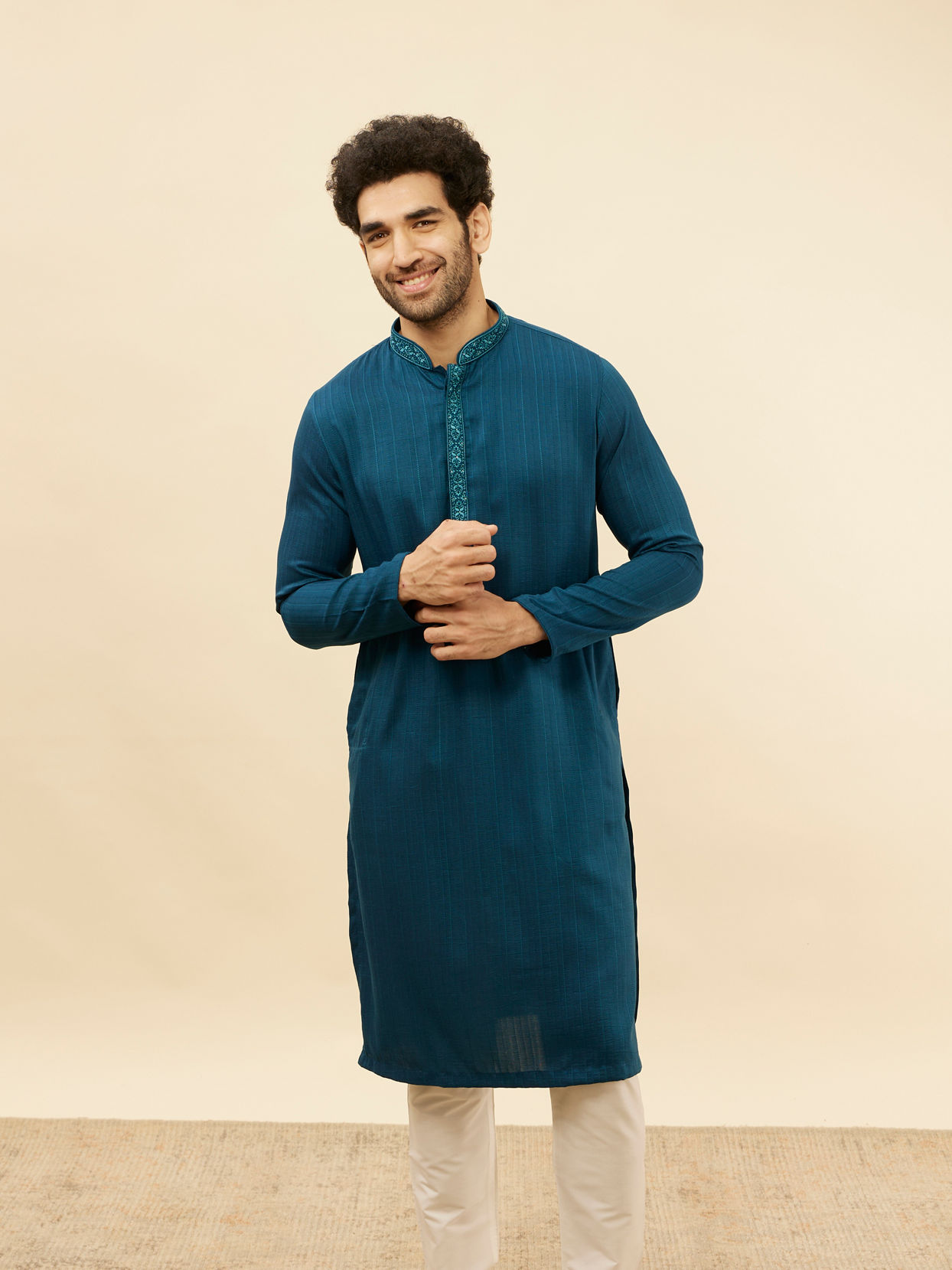 alt message - Manyavar Men Azure Blue Embroidered Placket Kurta Set image number 0