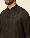 alt message - Manyavar Men Midnight Black Linear Patterned Kurta Set image number 1