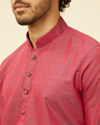 alt message - Manyavar Men Maroon Self Patterned Kurta Set image number 1