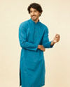 alt message - Manyavar Men Teal Blue Self Patterned Kurta Set image number 0