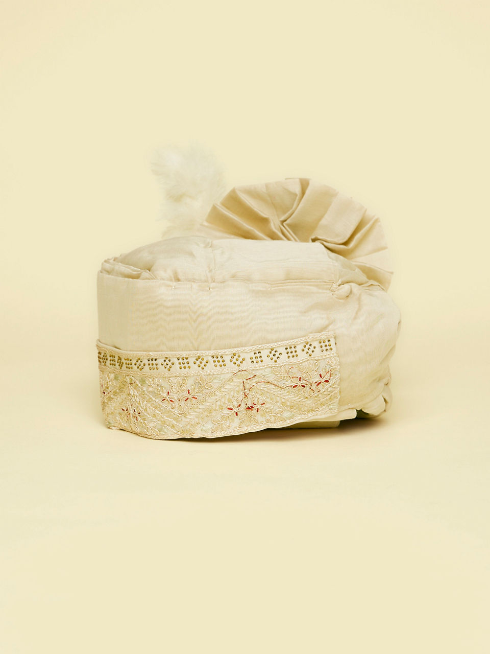 Manyavar Men Warm Cream Safa Embellished with Peacock Brooch