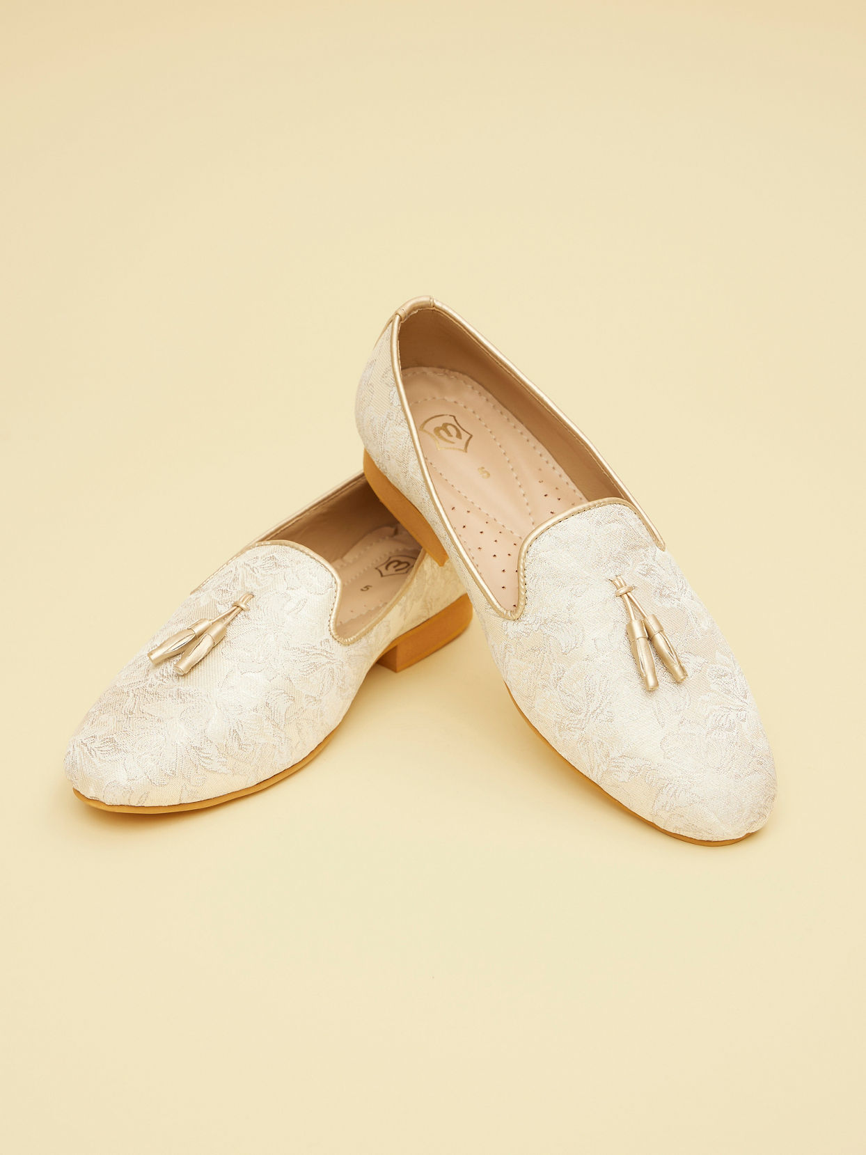 alt message - Manyavar Men Antique White Loafers with Soft Grey Floral Prints image number 0
